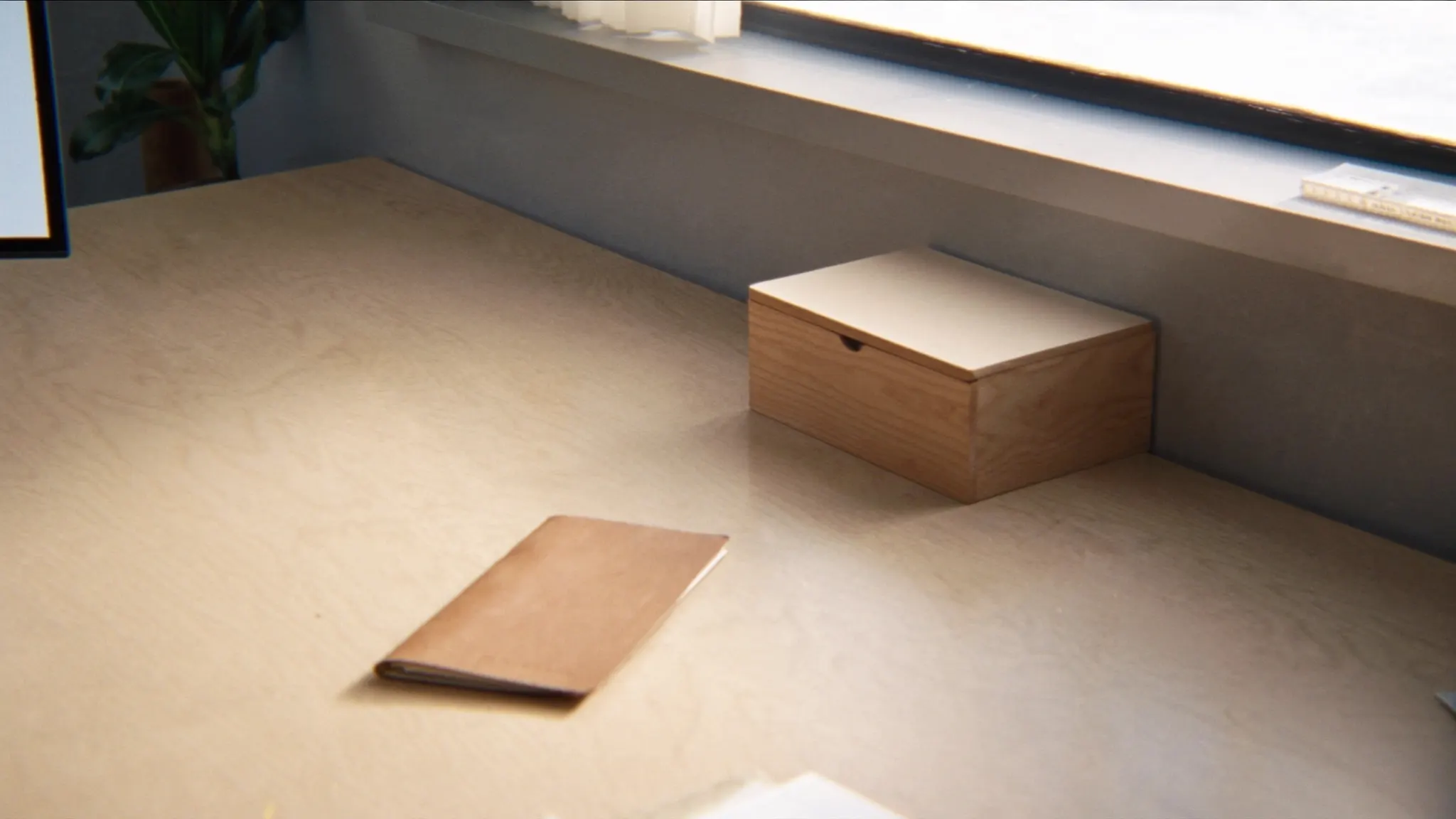 Automated quote-request follow-up, desk with a closed wooden card-index box